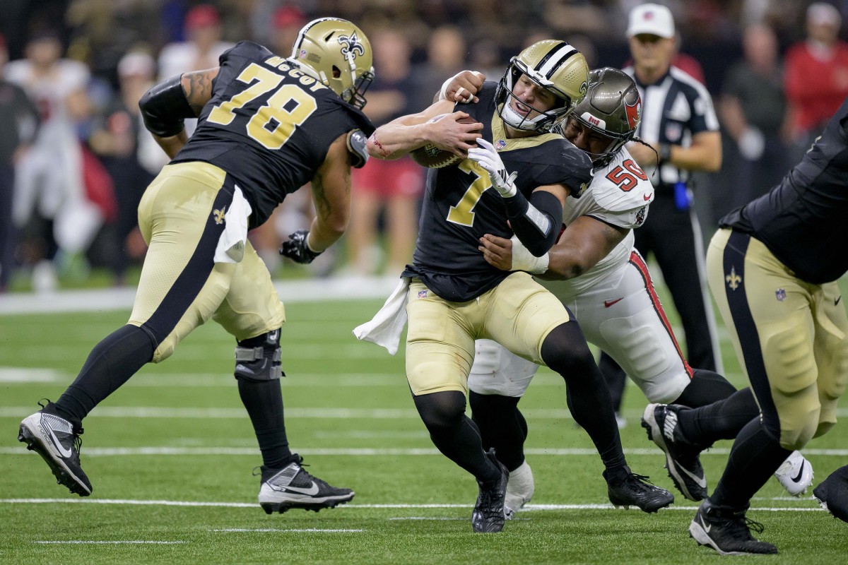 Taysom Hill (7) of the New Orleans Saints is tackled by Tampa Bay Buccaneers defensive tackle Vita Vea (50). Mandatory Credit: Matthew Hinton-USA TODAY